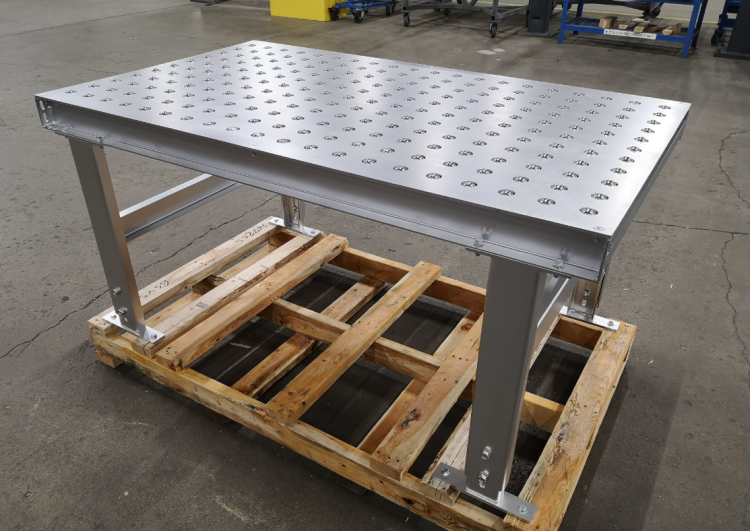 A custom transfer table built with a top plate